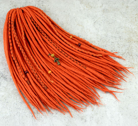 Orange wool dreads and braids
