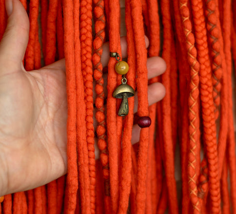 Orange wool dreads and braids